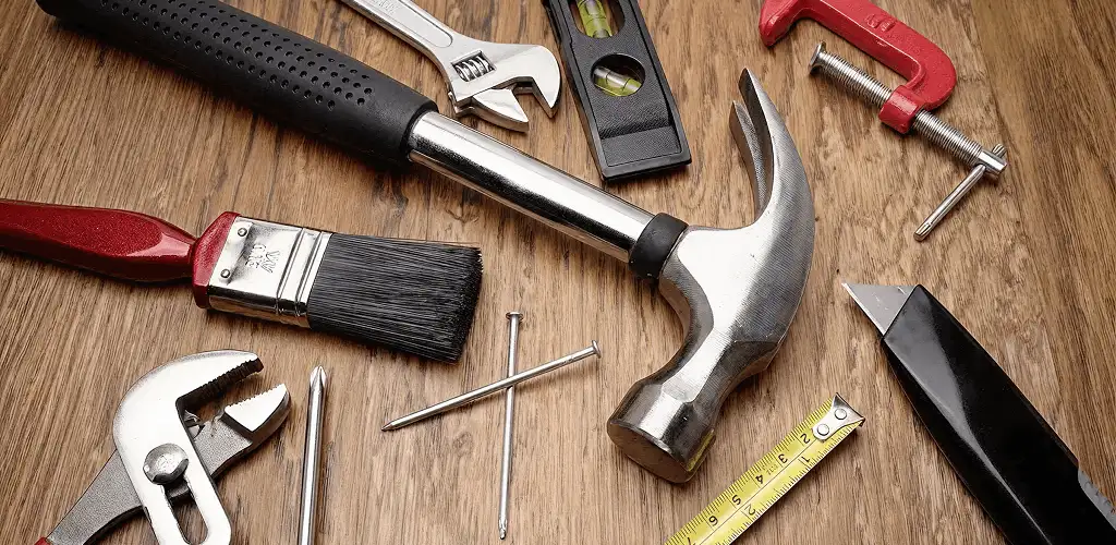 Handyman tools laid out for home repair and maintenance work in Rochester, NY
