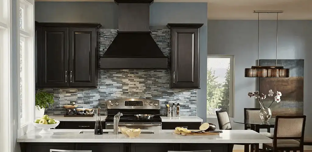 Kitchen cabinet painting and refinishing in a modern kitchen in Rochester, NY