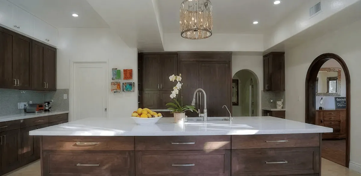 Cabinet refacing project with updated kitchen cabinets and island in Rochester, NY